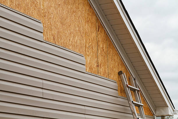 Professional Emergency Siding Repair technician working in Madison, CT
